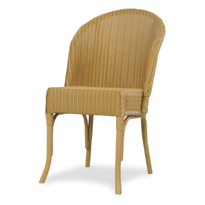 A beige colored dining chair with a loom patterned seat and backrest.
